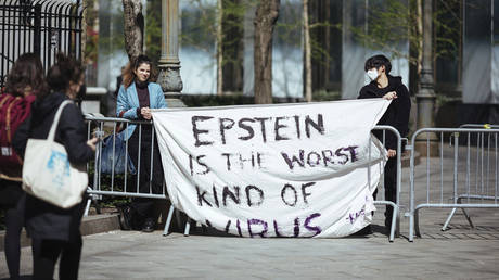 FILE PHOTO. Activists protesting Jeffrey Epstein associate Ghislaine Maxwell in front of the Federal Court in New York, April 23, 2021.