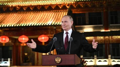 Russian President Vladimir Putin during his approach to media representatives at the Diaoyutai Residence in Beijing, China.