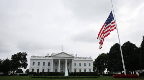 The American flags fly at half staff near the White House following the assassination of Charlie Kirk on September 10, 2025 in Washington, DC.