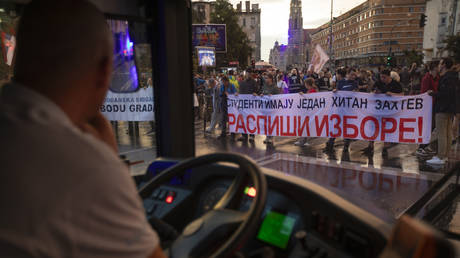 Protesters against the ruling party's policies march onto Bulevar Mihaila Pupina and block traffic in Novi Sad, Serbia, on September 14, 2025.