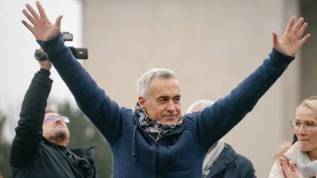 Former Romanian presidential candidate Calin Georgescu attends a rally in Bucharest.