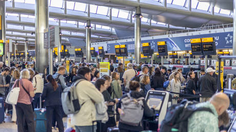 Passengers are seen at the London Heathrow airport in the UK, on September 21, 2025.