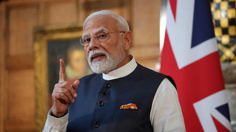 Prime Minister Narendra Modi of India gestures during a press conference on July 24, 2025 in Aylesbury, England.