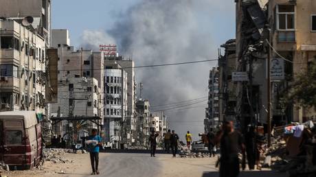 Smoke rises from the area targeted by Israeli forces in Gaza City.