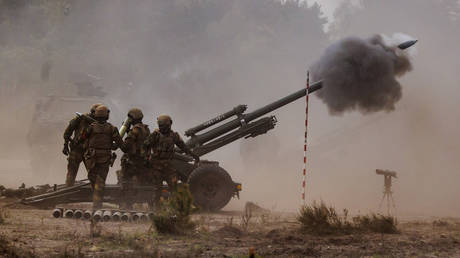 FILE PHOTO. Soldiers of the Belgian armed forces, participate with the Lightgun (LG) 1 105mm howitzer in the Wettiner Heide (Wettiner Meadow) international joint military exercises of NATO Response Force (Land) near Munster, Germany.