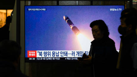 FILE PHOTO: A South Korean news broadcast showing the test launch of a Hwasong-19 by North Korea in November 2024.