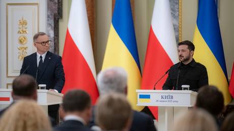 FILE PHOTO: Polish President Andrzej Duda and Ukraine's Vladimir Zelensky meet in Kiev, Ukraine, on June 27, 2025.