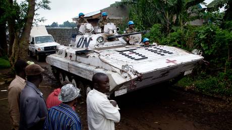 FILE PHOTO: UN peacekeepers in an armored light tank patrol the streets in the town of Bunagana in Congo.