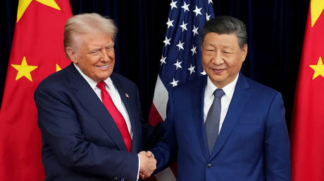US President Donald Trump (L) with Chinese President Xi Jinping (R) in Busan, South Korea, October 30, 2025.