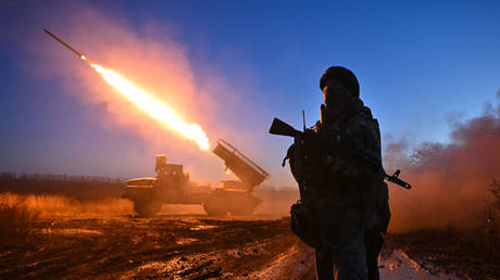 FILE PHOTO: Russian servicemen fire towards Ukrainian positions in the Krasnoarmeysk (Pokrovsk) sector of the front line.