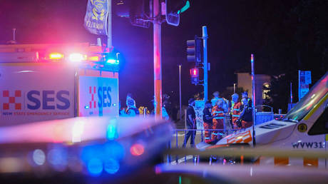 Police enforce a cordon at Bondi Beach after a mass shooting in Sydney, Australia on December 14, 2025.