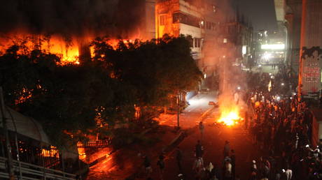 Protesters set fires at the offices of Bangladesh's leading daily newspapers *Prothom Alo* and *The Daily Star* in Dhaka, Bangladesh, on December 19, 2025.