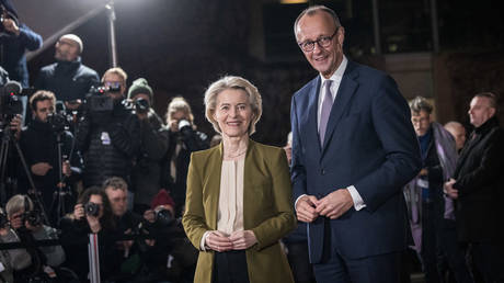 German Chancellor Friedrich Merz greets President of the European Commission Ursula von der Leyen at the Chancellery on December 15, 2025 in Berlin, Germany.