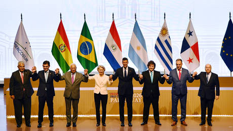 Leaders pose for an official photo during the signing of an EU–MERCOSUR agreement in Asuncion, Paraguay, January 17, 2026.